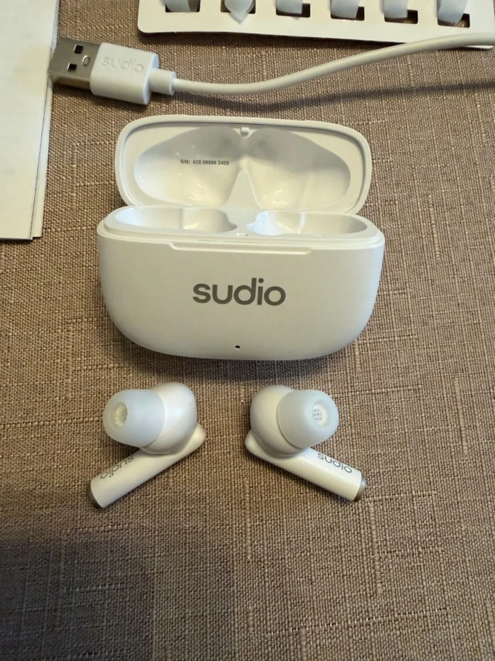 Like new Studio A1 Pro True Wireless Earbuds in White with Charging Case